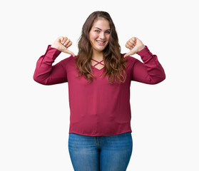 Beautiful plus size young woman over isolated background looking confident with smile on face, pointing oneself with fingers proud and happy.