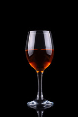 Glass of wine isolated on black background