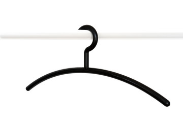 Empty black plastic cloth hanger on a rack isolated on white background minimalism style.