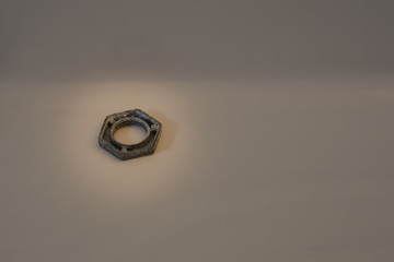 Isolated closeup of hardware hex nut