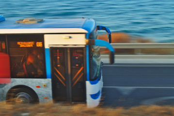 Moving bus on seaside