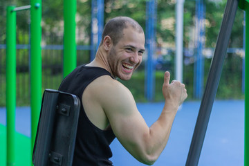 Obraz premium man athlete smile portrait happy handsome biceps young