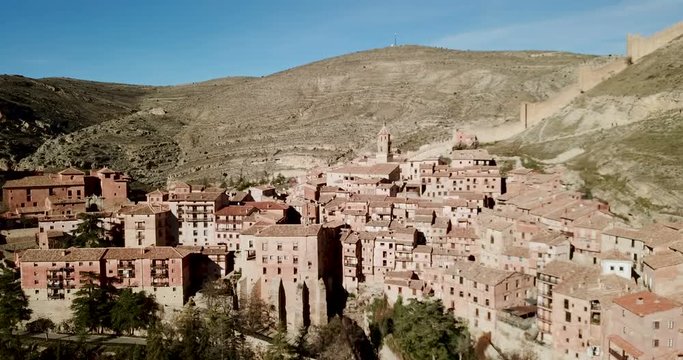 View from drone of Albarracin cityscape with ancient defensive walls and Cathedral tower, Aragon, Spain