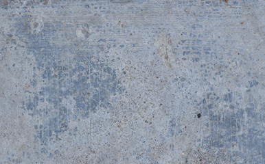 Grunge blue concrete wall with crack and stains in industrial building. Cement texture for design and background.