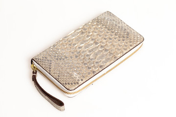 White Python leather wallet with zipper isolated on white background.
