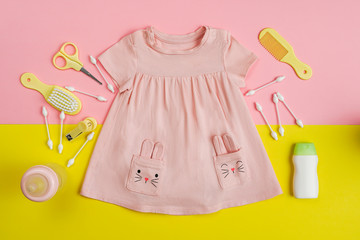 Baby girl dresseeding and necessities for baby