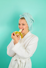 Cheerful woman eat banana. Tasty breakfast to woman at home. Healthy lifestyle. Healthy eating. Tropical fruits. Girl on diet. Breakfast. Girl having breakfast. Eating healthy food, fruits. Body care.