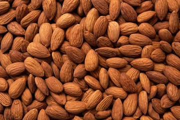 Fotobehang Close up of almonds for background. © Looker_Studio