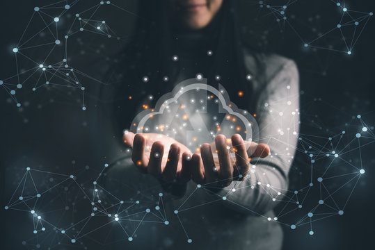 woman holding icon cloud computing network and data information in hand.Cloud computing and technology concept.