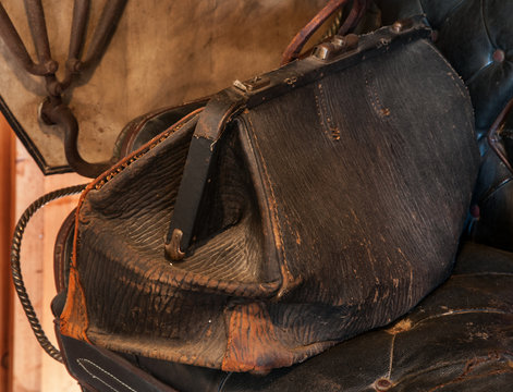 Old Doctors Bag On Seat Of Horse Buggy