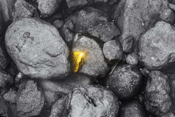 Different golden stone found around dirty rock business employee performance outstanding person...