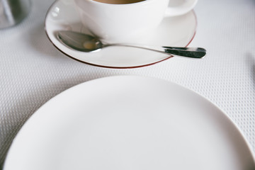 close up of clean coffee cup and plate