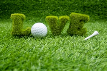 Gordijnen To golfer with love with golf ball on green grass © thaninee