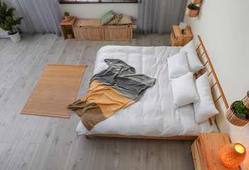Fototapeta na wymiar Room interior with comfortable bed, view through CCTV camera