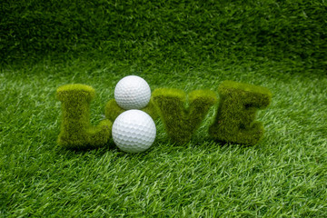 Golf with love on green grass