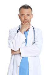 Portrait of experienced doctor in uniform on white background. Medical service