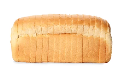 Gordijnen Gesneden brood van tarwebrood dat op wit wordt geïsoleerd © New Africa