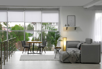 Cozy living room with modern furniture and stylish decor. Ideas for interior