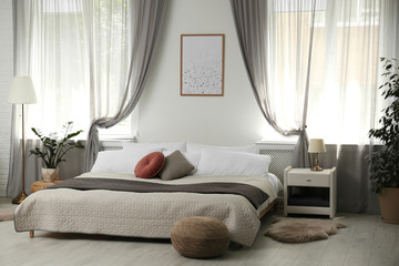 Stylish modern bedroom with decorative elements. Idea for interior design