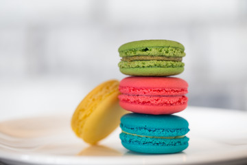 Sweet and colourful french macaroons or macaron on white background, Dessert.