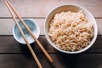 bowl of noodle and chopsticks without garnish
