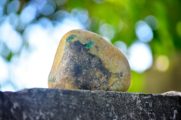 Genuine jade is a natural lump. That has not yet been cut Dark green, rare and 