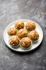 Leftover chapati Laddu / Churma Laddoo or Policha Ladu made with Roti, peanuts, dry fruits and jaggery. selective focus 