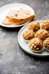 Leftover chapati Laddu / Churma Laddoo or Policha Ladu made with Roti, peanuts, dry fruits and jaggery. selective focus 