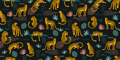 Vestor seamless pattern with leopards and abstract tropical leaves. © Nadia Grapes