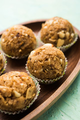 Leftover chapati Laddu / Churma Laddoo or Policha Ladu made with Roti, peanuts, dry fruits and jaggery. selective focus 