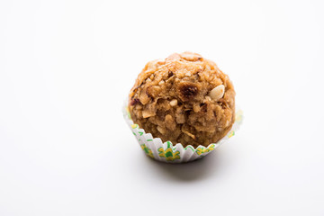 Leftover chapati Laddu / Churma Laddoo or Policha Ladu made with Roti, peanuts, dry fruits and jaggery. selective focus 