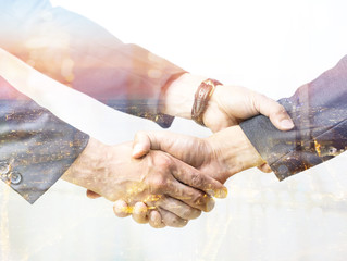 Business trust commitment which Business Partners holding hands with Help, trust ,support ,empathy...