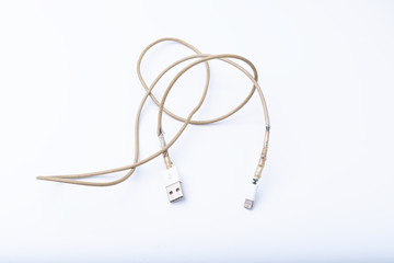 Broken Smart Phone Charger Cable on white Background. 