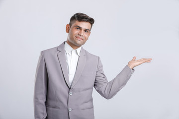 Young Indian Man In Suit and showing different expression 
