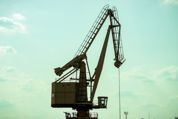 Crane in the seaport for coal loading.