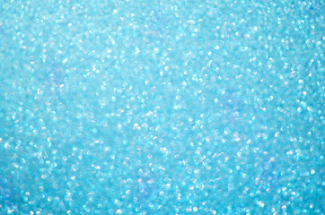Fototapeta na wymiar Blue glitter bokeh background. Festive concept. - Image