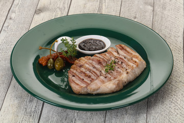 Grilled pork steak with pepper sauce