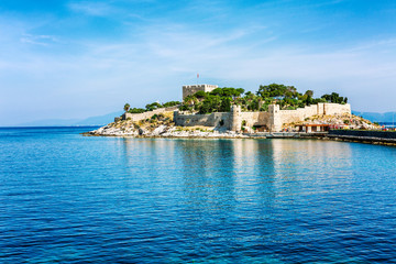Beautiful island in the sea with an old fortress. Clear sunny day. Gorgeous landscape.