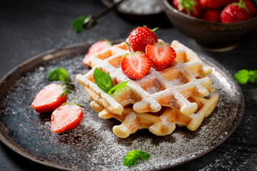 Fresh wafers with sweet strawberries and mint