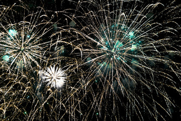 Celebration of the New Year fireworks. Colorful fireworks in the sky. Many bright fireworks