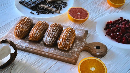 sweets surrounded by fruit