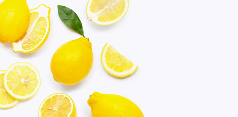 Fresh lemon with slices isolated on white.