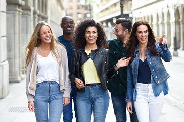 Group of friends having fun together outdoors