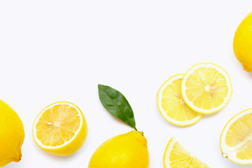 Fresh lemon with slices isolated on white.