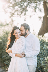 Naklejka premium Happy couple at sunset in Rome. Wedding love story in Italy.
