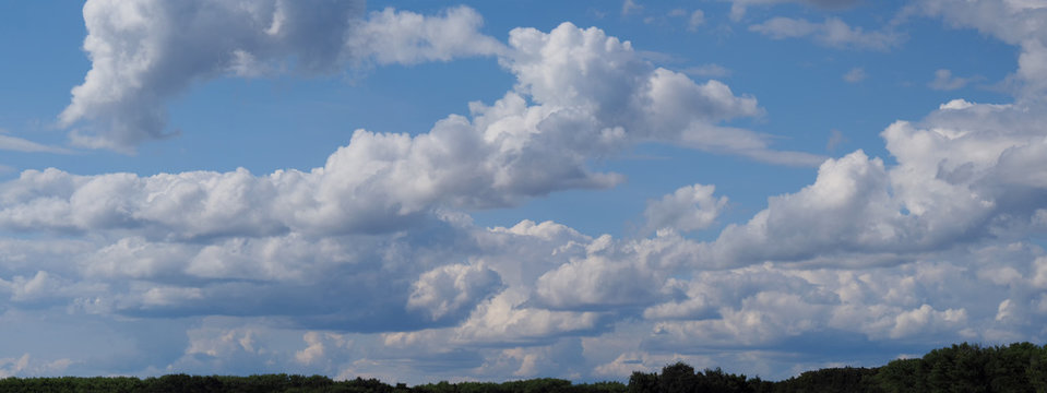 Horizontal Panorama of the sky and white dense clouds to the horizon. Weather forecast. © Sergey