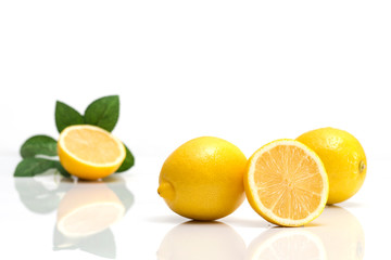 Juicy lemons on a completely white background. Fruits and vitamins.........