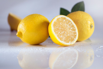 Juicy lemons on a completely white background. Fruits and vitamins.