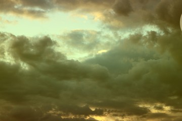 amazing unreal colorful fantasy sun colored partially cloudy sky for using in design as background.