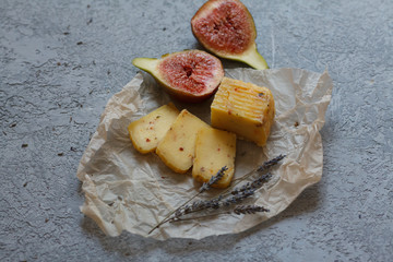 food photo rustic Breakfast cheese and figs and lavender in Provence style